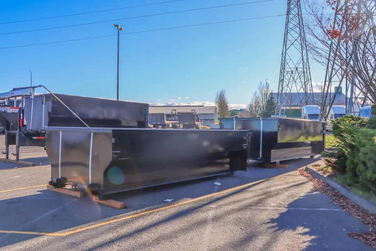 Roll-off dumpster ready for waste disposal at job site for 2 Yard Dumpster Rental in Hubbard